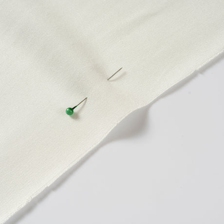 White rayon woven fabric showing a clean textile surface for material sourcing